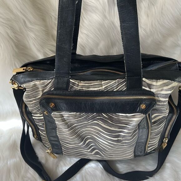 - Tory Burch Nylon Zebra prints & black leather Weekender bag with shoul… - Picture 4 of 15